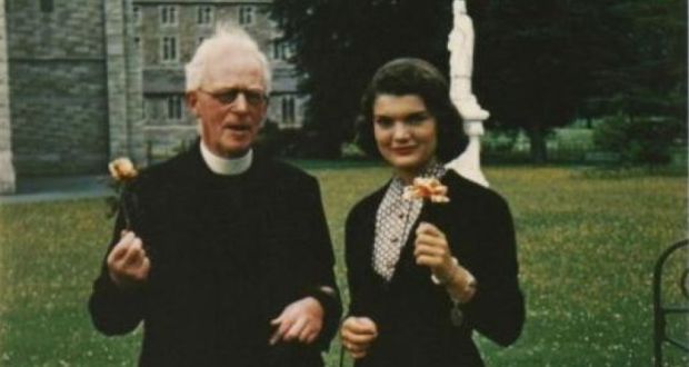 Jackie Kennedy with priest