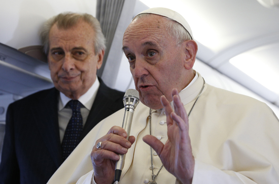 Pope on plane back from Strasbourg 
