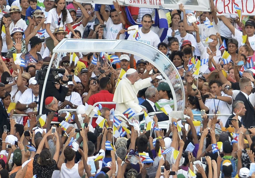Pope Francis greets crowds in Revolution Square