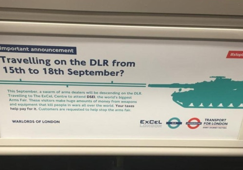 Advert protesting against the DSEI arms fair in London