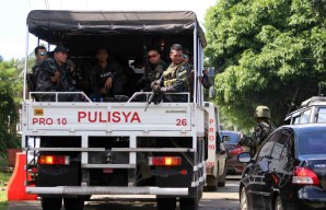 Islamic State-linked militants take Catholic priest and parishioners hostage in the Philippines