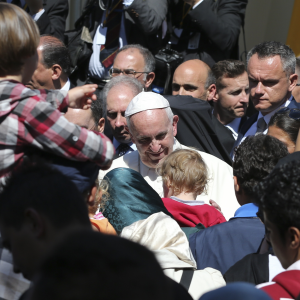 Pope Francis takes Muslim refugees home on Vatican plane after visit to Lesbos