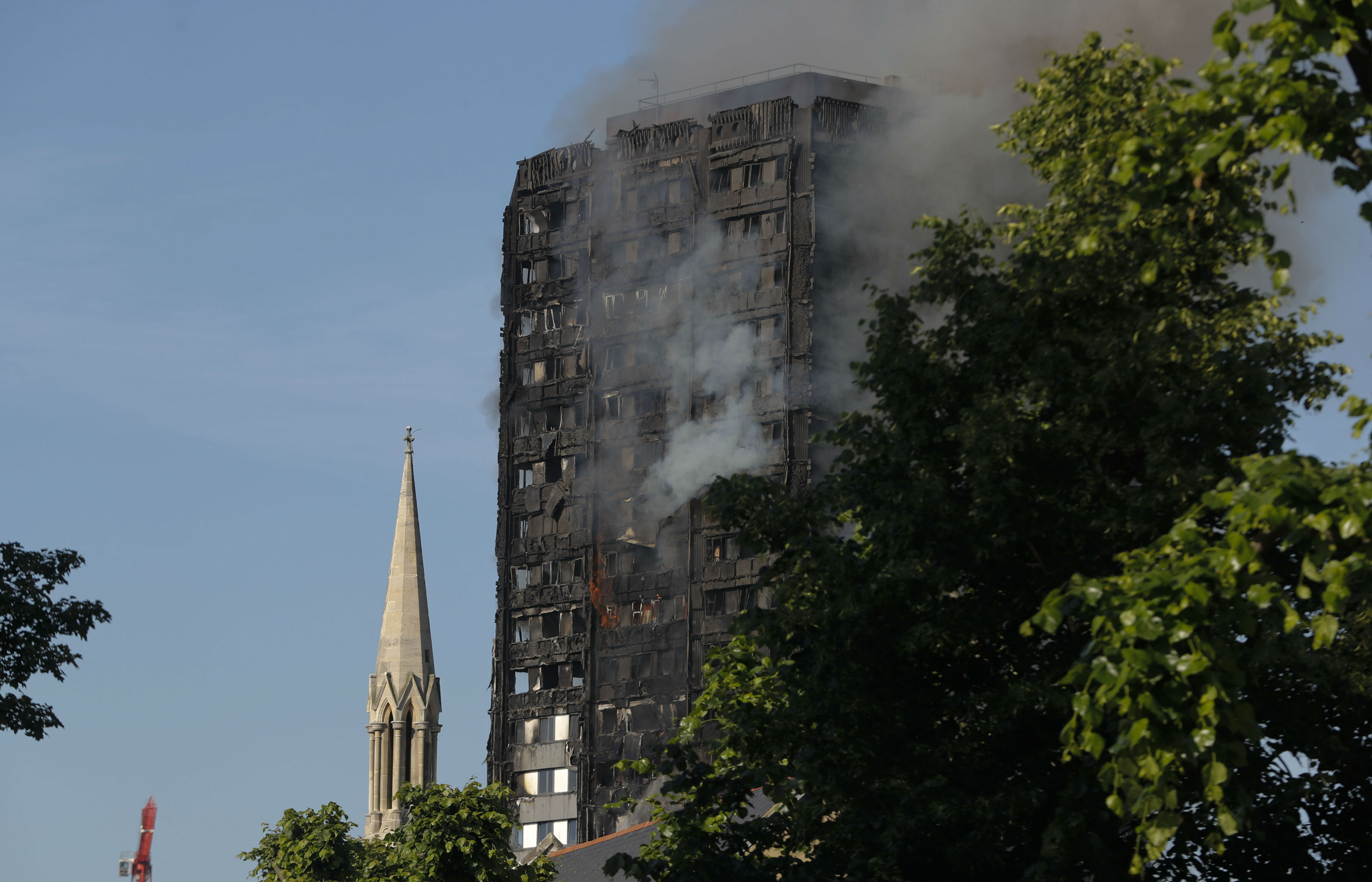Archbishop of Westminster offers prayers as twelve die in West London 'towering inferno' 