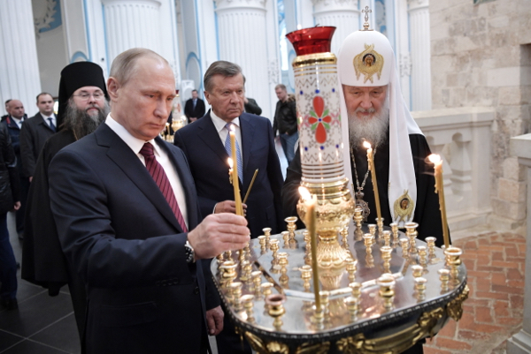 Russia's President Putin lauds new church-state link 