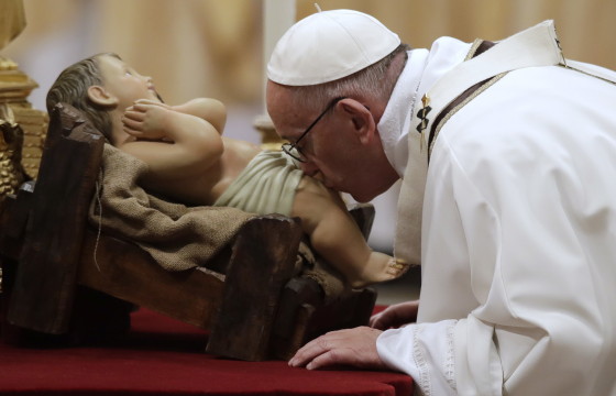 Pope's midnight mass message: 'The lights of commercialisation cast God into the shadows'