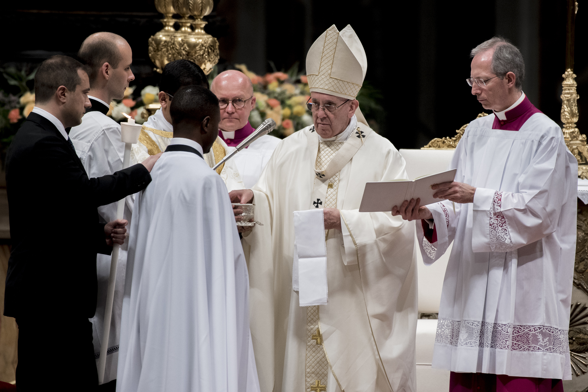 Pope Francis baptises Italy's 'migrant hero' at Easter Vigil