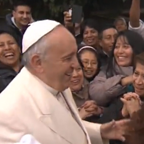 Pope pays surprise visit to homeless immigrants
