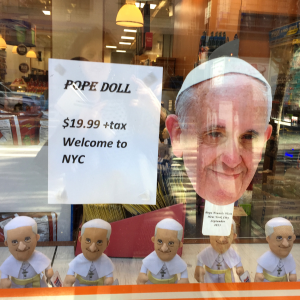 Pope Francis warns Catholic pilgrims to be beware of scams after £50,000 police raid
