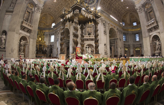Bishops and cardinals pray as Pope Francis celebrates the opening Mass of the Synod of bishops
