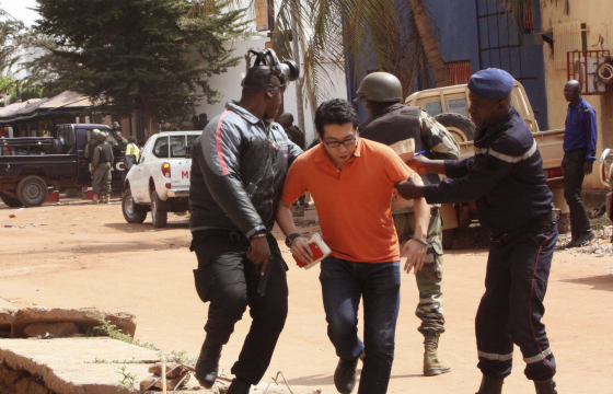 Security services in Mali help a hostage escape from the Radisson Hotel