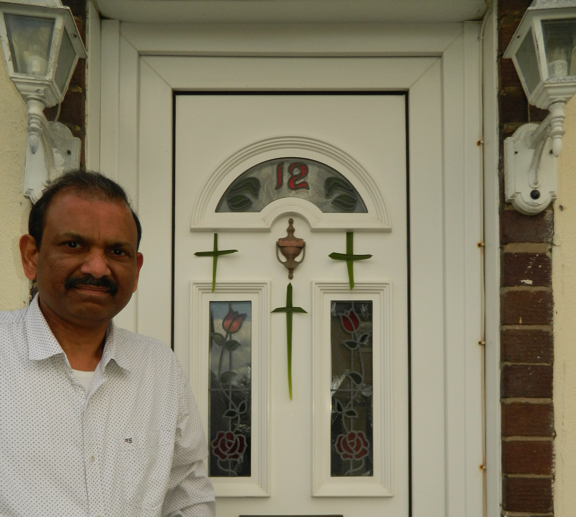 Hang a green cross on your door this Palm Sunday
