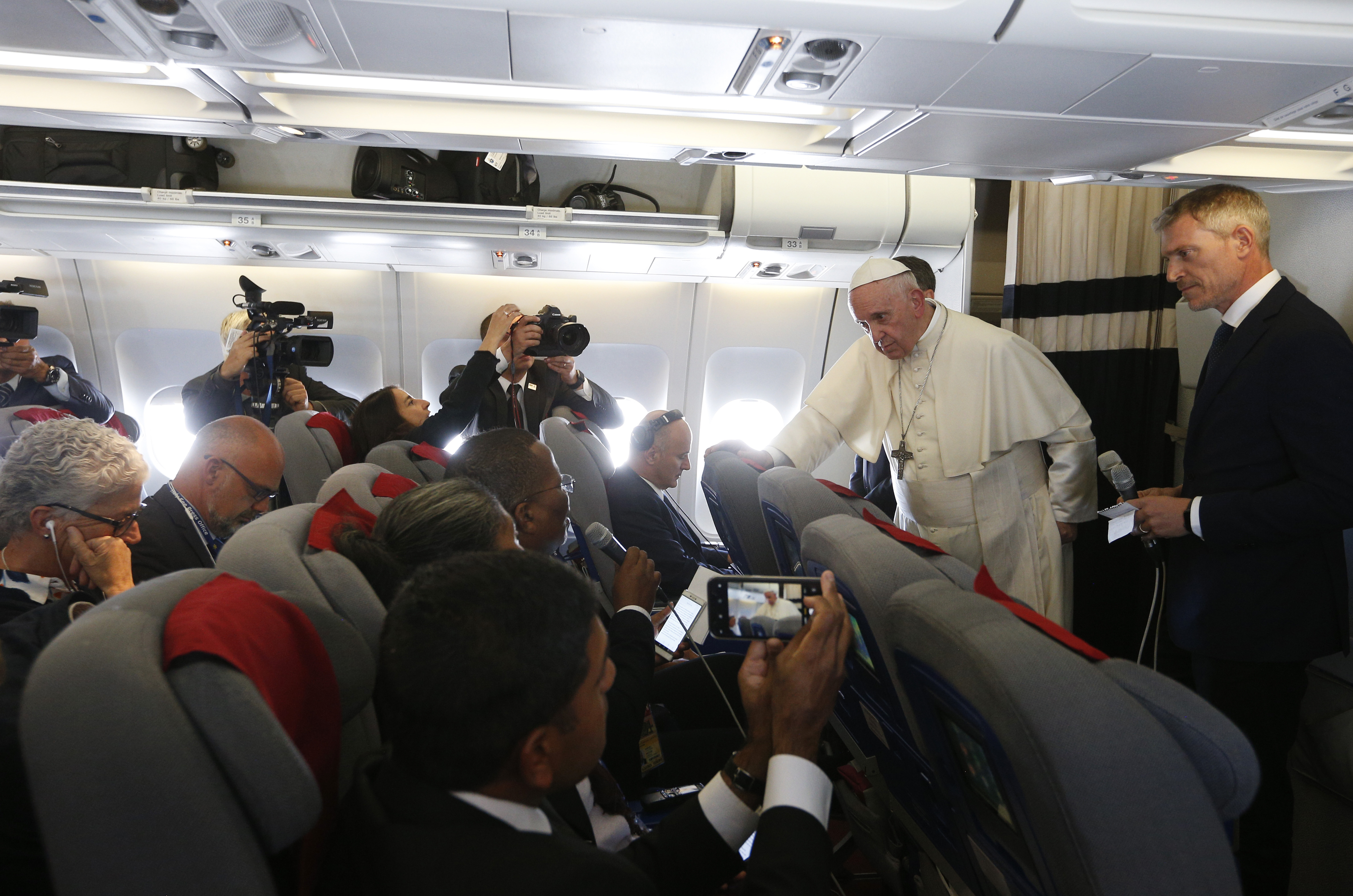 'Just the facts,' pope tells reporters, commenting on news media
