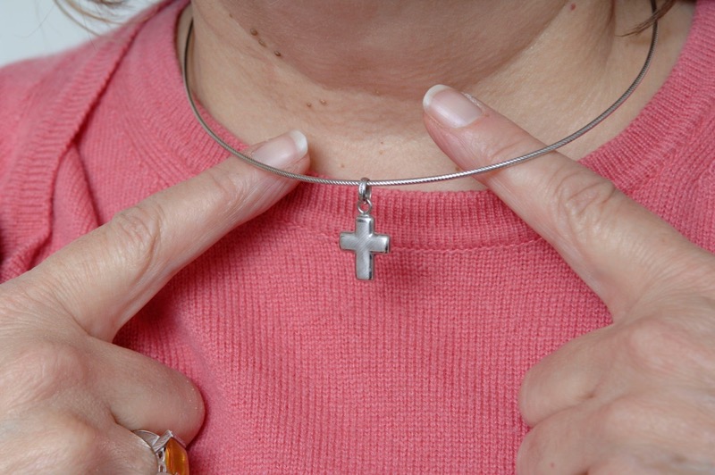 Catholic nurse wins discrimination claim over religious necklace