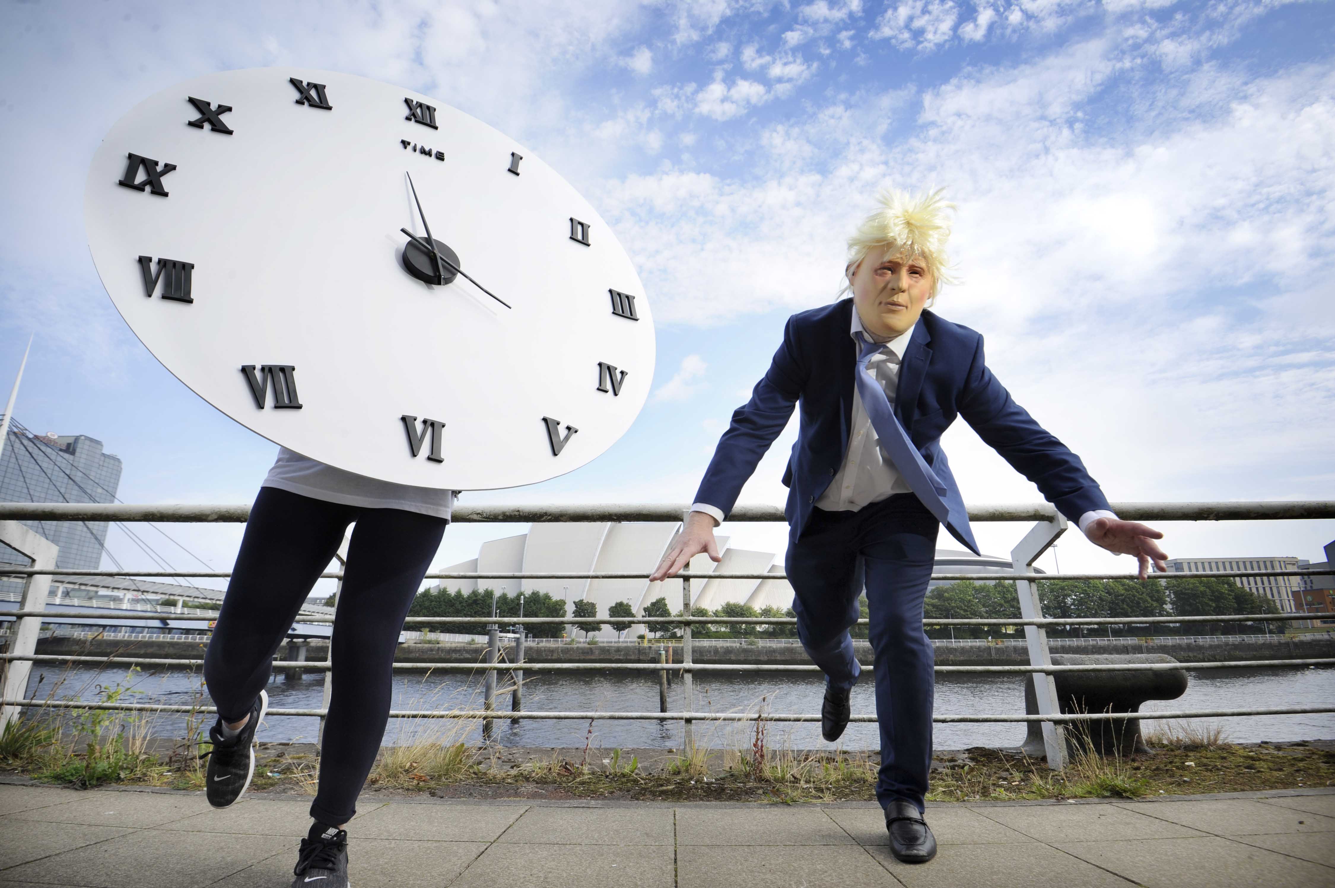 Boris Johnson lookalike in 'race' against COP26 clock