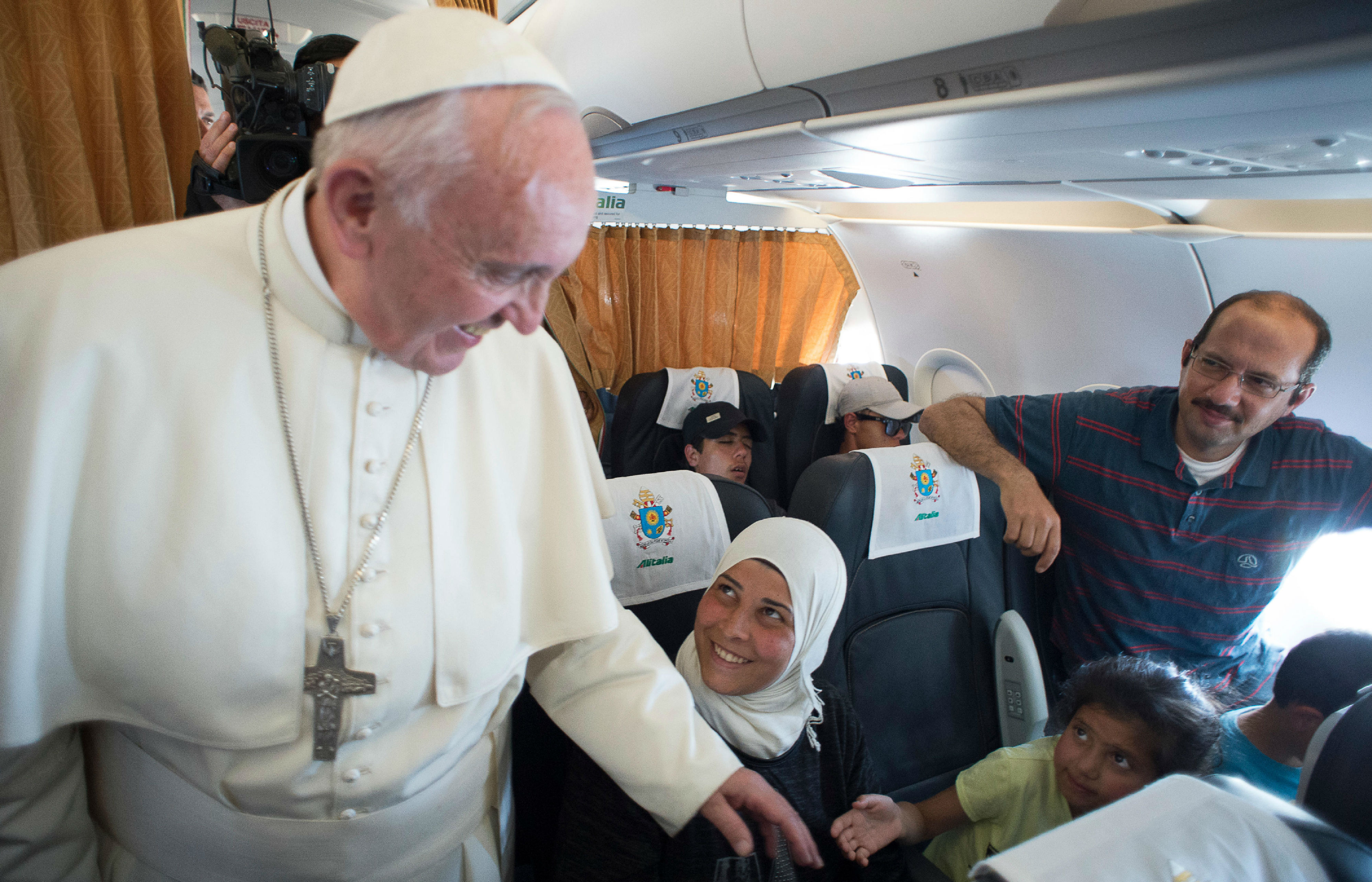 Pope issues action plan to help migrants assimilate into new cultures and criticises moves to expel refugees fleeing persecution
