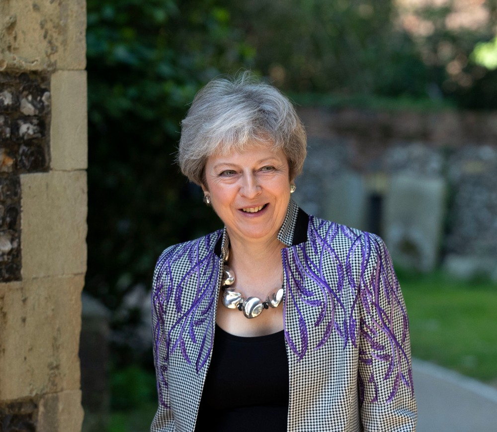 May raises plight of persecuted Christians at Easter