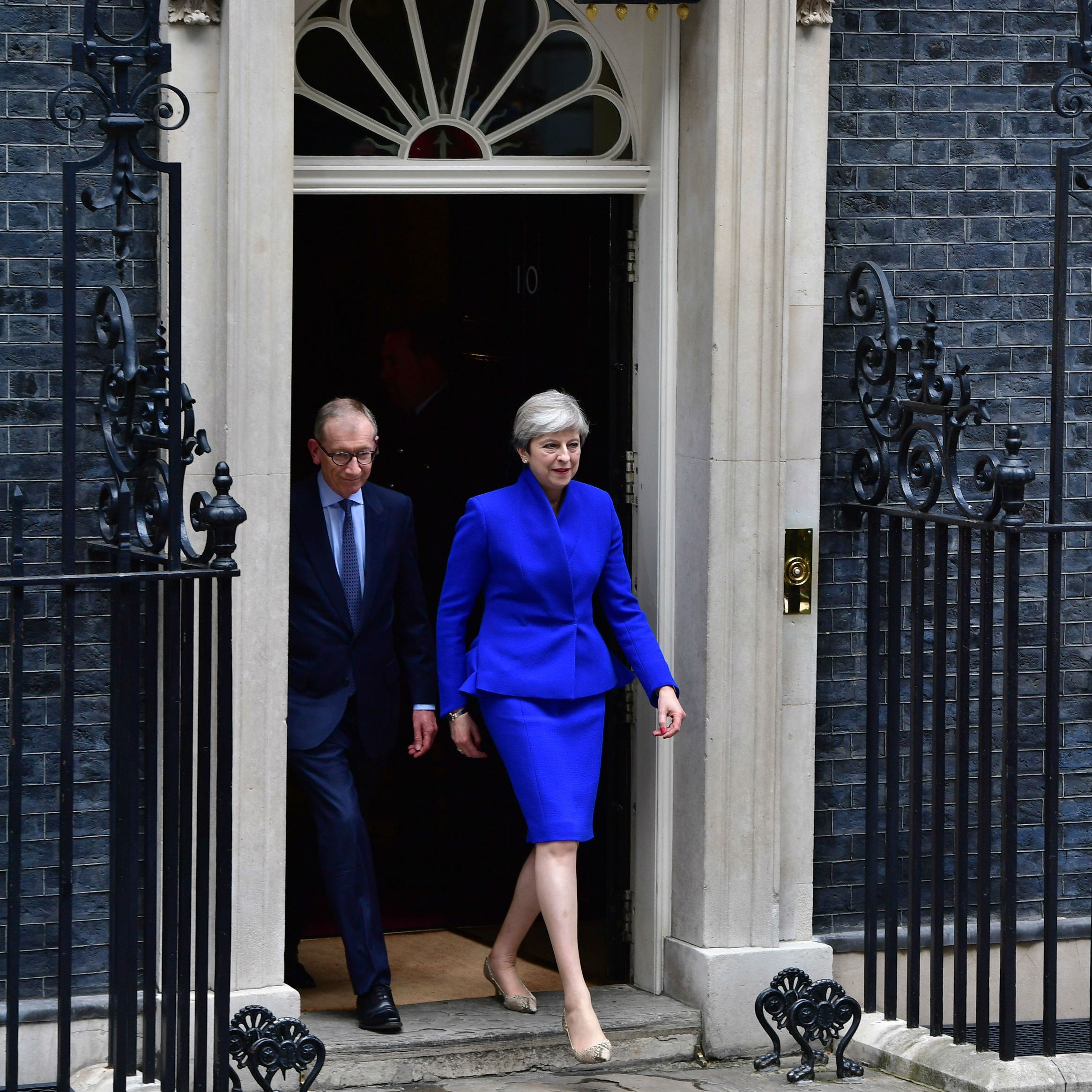 May strikes deal with DUP to form UK government as general election ends in hung parliament 