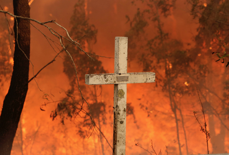 Priests find light amid fiery dark of Australia