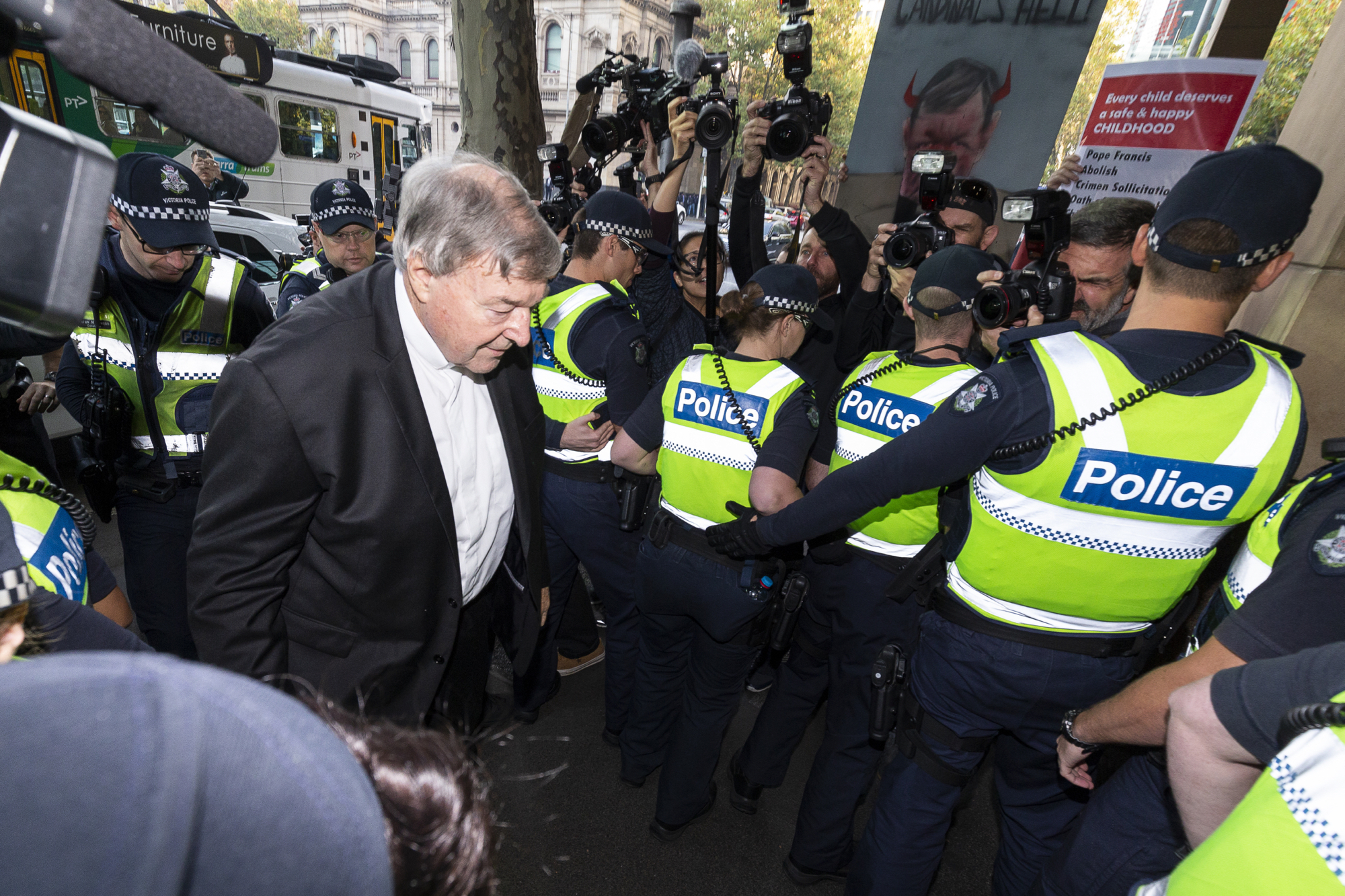 Cardinal Pell to face trial on several charges of sexual assault