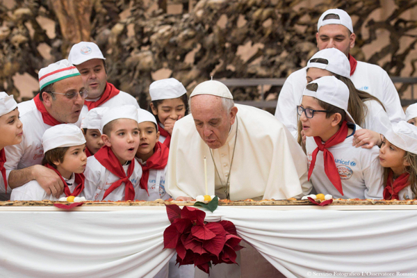 Pope celebrates 81st birthday with children and 13-foot pizza 