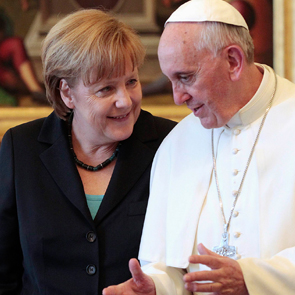 Merkel tells Christians to keep faith as migrant crisis intensifies