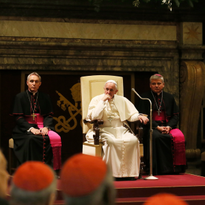 Pope Francis seeks to redress last year's harsh words for the curia