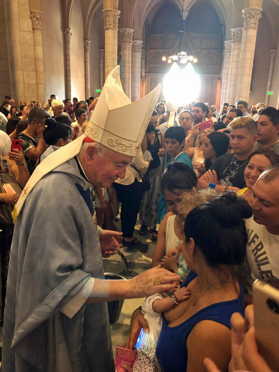 Cardinal blesses pilgrims at the national shrine in Lujan after mass