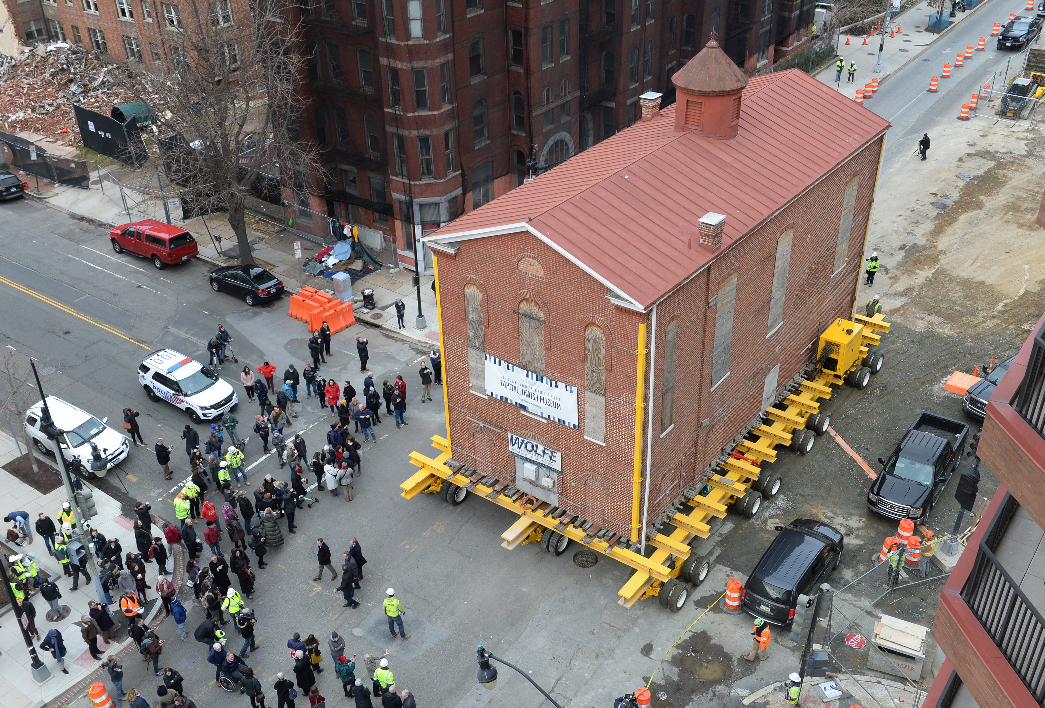 Workers move Adas Israel synagogue one block south to its new location to be incorporated into the Capital Jewish Museum in Washington