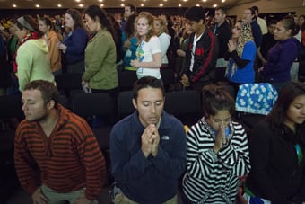 Young people praying at World Youth Day in Brazil