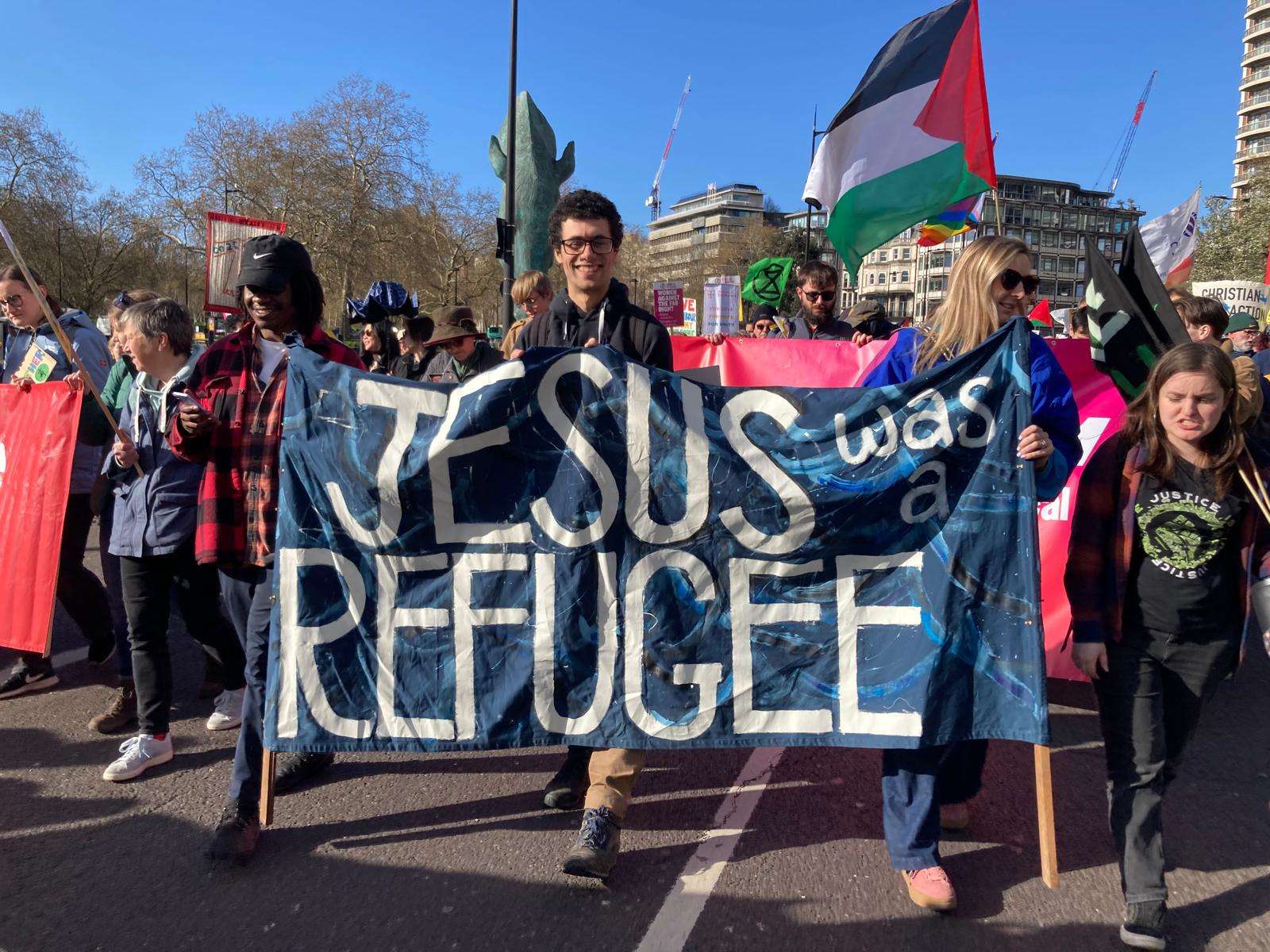 ‘Christians stand with refugees’: huge crowds march through London against the far right