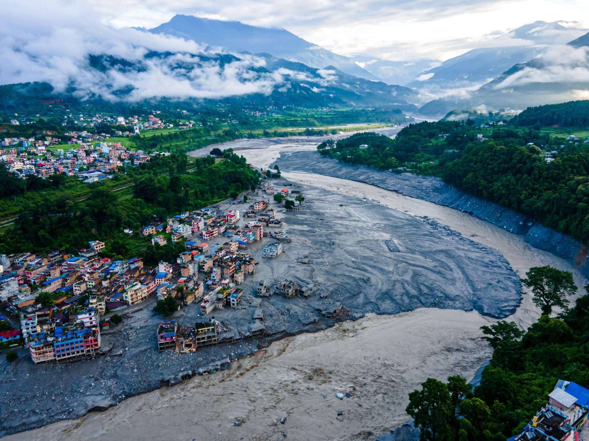 Prayers and aid for Nepal after floods kill hundreds and leave thousands missing
